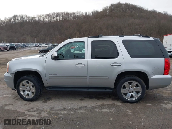 2013 GMC Yukon SLT with VIN 1GKS2CE07DR315820, listed as a IAAI auction lot 41653433 with 137,491 mi miles. Bid and sale history available at carsss.com. Image 14.