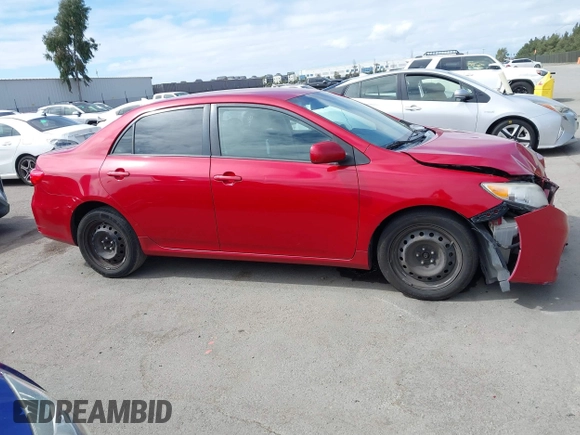 2012 Toyota Corolla L with VIN 5YFBU4EE7CP003044, listed as a IAAI auction lot 42044928 with 256,796 mi miles. Bid and sale history available at carsss.com. Image 13.