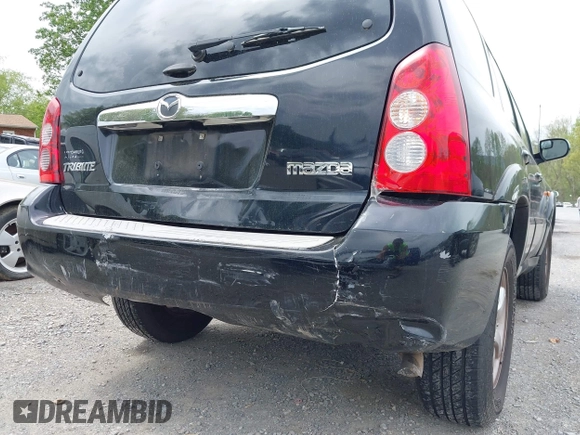 2005 Mazda Tribute S with VIN 4F2CZ96185KM16560, listed as a IAAI auction lot 42065748 with 84,584 mi miles and . Bid and sale history available at carsss.com. Image 12.