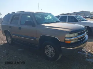 2004 Chevrolet Tahoe LT z VIN 1GNEC13Z04R130978, wystawiony jako IAAI lot #42073871 z przebiegiem 214 947 mil mil oraz . Historia ofert i sprzedaży dostępna na DreamBid. Obrazek 1.