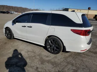 2021 Honda Odyssey EX-L with VIN 5FNRL6H78MB019258, listed as a Copart auction lot 52496285 with 33,734 mi miles and Salvage Title. Bid and sale history available at DreamBid. Image 2.