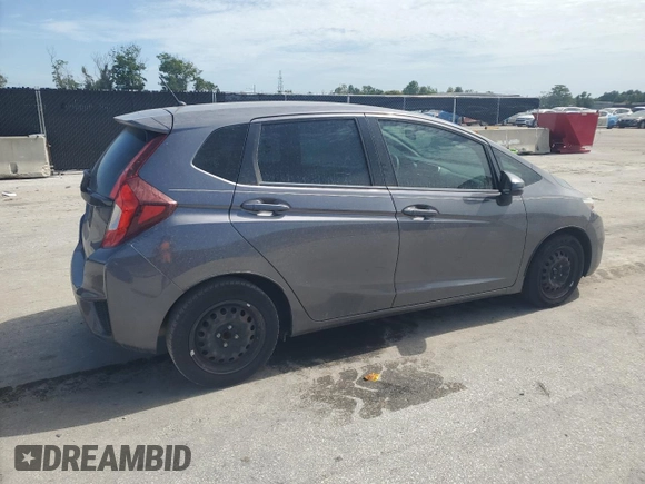 2015 Honda Fit LX with VIN 3HGGK5H56FM717242, listed as a Copart auction lot 62993835 with 155,310 mi miles and Clean title. Bid and sale history available at DreamBid. Image 3.