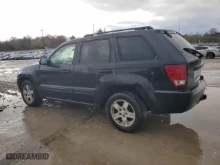 2005 Jeep Grand Cherokee Laredo with VIN 1J4HS48N05C505136, listed as a Copart auction lot 80583084 with 326,881 mi miles and Salvage Title. Bid and sale history available at carsss.com. Image 2.