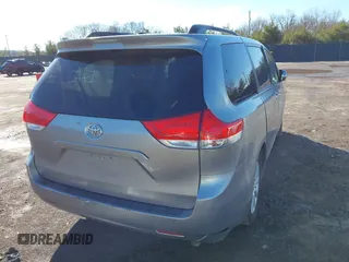 2012 Toyota Sienna XLE with VIN 5TDDK3DC6CS045009, listed as a IAAI auction lot 41790571 with 154,817 mi miles. Bid and sale history available at carsss.com. Image 4.