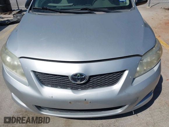2009 Toyota Corolla with VIN 1NXBU40E79Z134599, listed as a IAAI auction lot 42035077 with 154,051 mi miles. Bid and sale history available at carsss.com. Image 6.