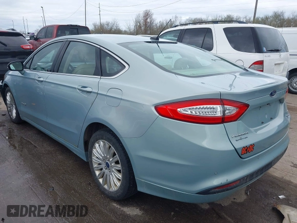 2013 Ford Fusion SE Hybrid with VIN 3FA6P0LUXDR339767, listed as a IAAI auction lot 41920621 with 135,274 mi miles. Bid and sale history available at carsss.com. Image 3.
