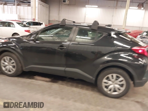 2021 Toyota C-HR LE with VIN JTNKHMBX0M1120864, listed as a IAAI auction lot 41911332 with 37,593 mi miles. Bid and sale history available at carsss.com. Image 15.