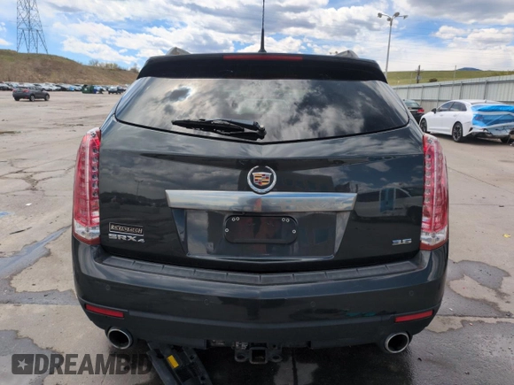 2014 Cadillac SRX Premium Collection z VIN 3GYFNGE34ES676646, wystawiony jako Copart lot #53478695 z przebiegiem 115 096 mil mil oraz Szkoda całkowita • Salvage title. Historia ofert i sprzedaży dostępna na DreamBid. Obrazek 6.