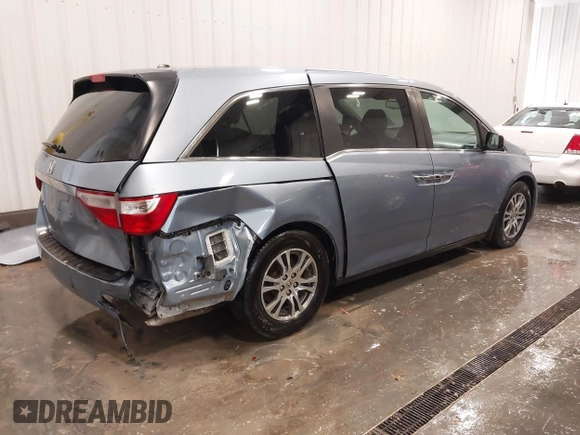 2013 Honda Odyssey EX-L with VIN 5FNRL5H67DB015512, listed as a IAAI auction lot 41758695 with 193,356 mi miles and . Bid and sale history available at carsss.com. Image 4.