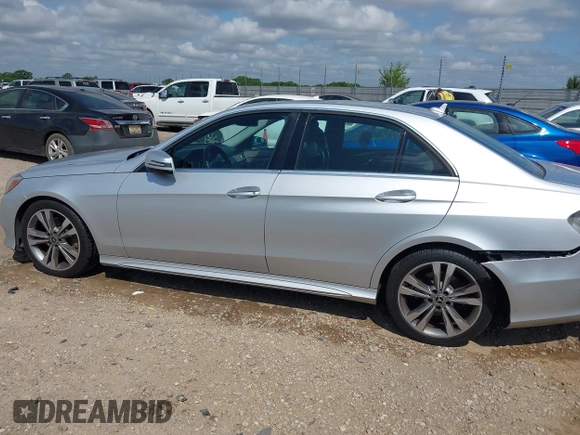 2014 Mercedes-Benz E 350 Sport with VIN WDDHF5KB4EA973595, listed as a IAAI auction lot 42125379 with 162,320 mi miles and . Bid and sale history available at DreamBid. Image 14.