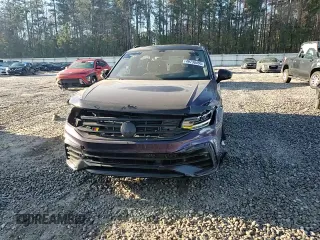2023 Volkswagen Tiguan SE R-Line Black with VIN 3VV8B7AX5PM127059, listed as a Copart auction lot 49730495 with 33,068 mi miles and Salvage Title. Bid and sale history available at DreamBid. Image 12.