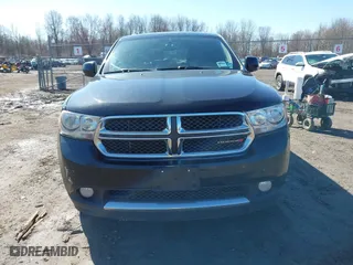 2013 Dodge Durango Crew with VIN 1C4RDJDG6DC540482, listed as a IAAI auction lot 41813209 with 140,875 mi miles. Bid and sale history available at carsss.com. Image 12.