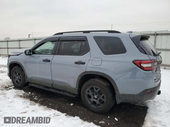 2025 Honda Pilot TrailSport with VIN 5FNYG1H69SB003433, listed as a Copart auction lot 44587005 with 16,854 mi miles and Salvage Title. Bid and sale history available at carsss.com. Image 2.