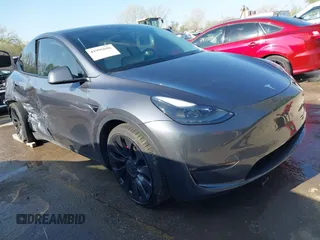 2023 Tesla Model Y Performance z VIN 7SAYGDEF3PF595170, wystawiony jako IAAI lot #41995696 z przebiegiem 27 136 mil mil oraz . Historia ofert i sprzedaży dostępna na DreamBid. Obrazek 1.