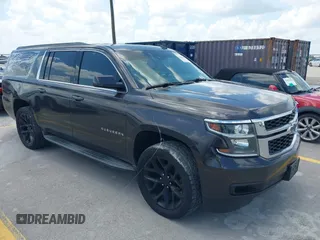 2015 Chevrolet Suburban LT z VIN 1GNSKJKC9FR245097, wystawiony jako IAAI lot #42468168 z przebiegiem 198 454 mil mil oraz . Historia ofert i sprzedaży dostępna na DreamBid. Obrazek 1.