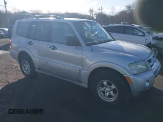 2003 Mitsubishi Montero z VIN JA4NW31S93J037224, wystawiony jako IAAI lot #41848661 z przebiegiem 206 151 mil mil oraz . Historia ofert i sprzedaży dostępna na DreamBid. Obrazek 1.