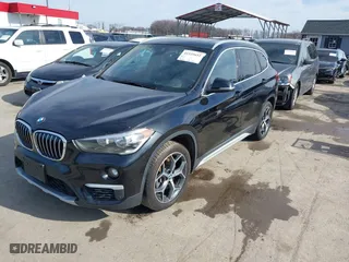 2019 BMW X1 xDrive28i with VIN WBXHT3C51K5L89758, listed as a IAAI auction lot 41535652 with 96,612 mi miles. Bid and sale history available at carsss.com. Image 17.