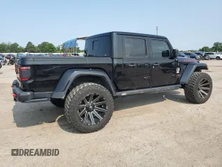 2020 Jeep Gladiator Rubicon with VIN 1C6JJTBG2LL166964, listed as a Copart auction lot 58041945 with 62,716 mi miles and Salvage title. Bid and sale history available at DreamBid. Image 3.