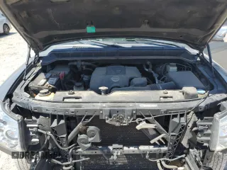 2015 Nissan Titan Pro-4X with VIN 1N6BA0EC5FN514184, listed as a Copart auction lot 56721065 with 127,283 mi miles and Salvage title. Bid and sale history available at DreamBid. Image 11.