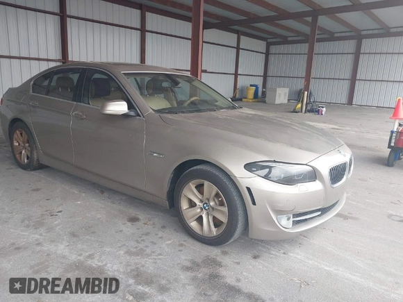 2013 BMW 5 Series 528i with VIN WBAXG5C52DDY35141, listed as a IAAI auction lot 41883031 with 112,917 mi miles and . Bid and sale history available at carsss.com. Image 1.