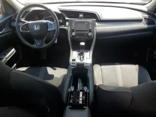 2020 Honda Civic LX z VIN 2HGFC2F64LH592299, wystawiony jako Copart lot #57040525 z przebiegiem 154 093 mil mil oraz Szkoda całkowita • Salvage title. Historia ofert i sprzedaży dostępna na DreamBid. Obrazek 8.