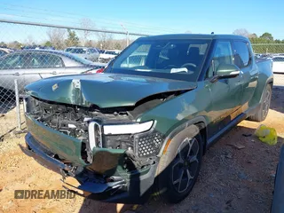 2022 Rivian R1T Adventure Package with VIN 7FCTGAAA2NN006098, listed as a IAAI auction lot 41172815 with 1 mi miles. Bid and sale history available at carsss.com. Image 17.