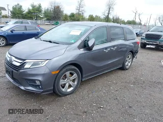 2018 Honda Odyssey EX-L z VIN 5FNRL6H70JB025227, wystawiony jako IAAI lot #41940992 z przebiegiem 95 797 mil mil oraz . Historia ofert i sprzedaży dostępna na DreamBid. Obrazek 18.