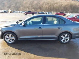 2014 Volkswagen Jetta TDI with VIN 3VWLL7AJ7EM276956, listed as a IAAI auction lot 41865670 with 135,159 mi miles and . Bid and sale history available at DreamBid. Image 14.