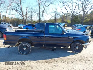 1997 Ford Ranger XLT z VIN 1FTCR10A1VUC49988, wystawiony jako IAAI lot #41257264 z przebiegiem 414 401 mil mil oraz . Historia ofert i sprzedaży dostępna na DreamBid. Obrazek 13.
