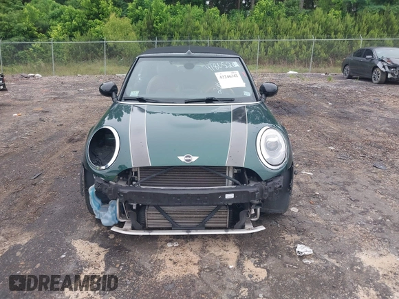 2016 MINI Convertible with VIN WMWWG5C51G3C19231, listed as a IAAI auction lot 42246342 with 93,576 mi miles and . Bid and sale history available at DreamBid. Image 12.