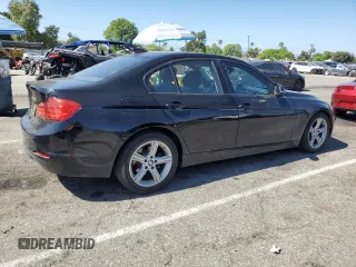 2014 BMW 3 Series 328i with VIN WBA3C1G56ENR49944, listed as a Copart auction lot 60330895 with 50,692 mi miles and Salvage title. Bid and sale history available at DreamBid. Image 3.