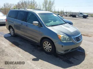 2009 Honda Odyssey EX-L with VIN 5FNRL38619B401970, listed as a IAAI auction lot 42017650 with 137,109 mi miles. Bid and sale history available at carsss.com. Image 1.
