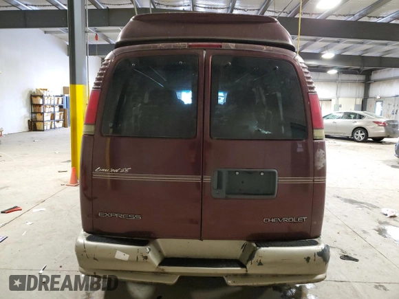 2002 Chevrolet Express z VIN 1GBFG15R921215686, wystawiony jako Copart lot #75614424 z przebiegiem Nie podano mil oraz Szkody całkowita. Historia ofert i sprzedaży dostępna na DreamBid. Obrazek 6.