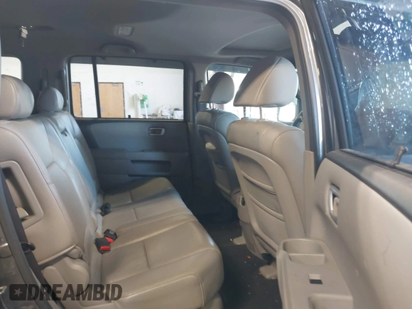 2010 Honda Pilot Touring with VIN 5FNYF4H89AB026005, listed as a IAAI auction lot 42118607 with 182,689 mi miles. Bid and sale history available at carsss.com. Image 8.