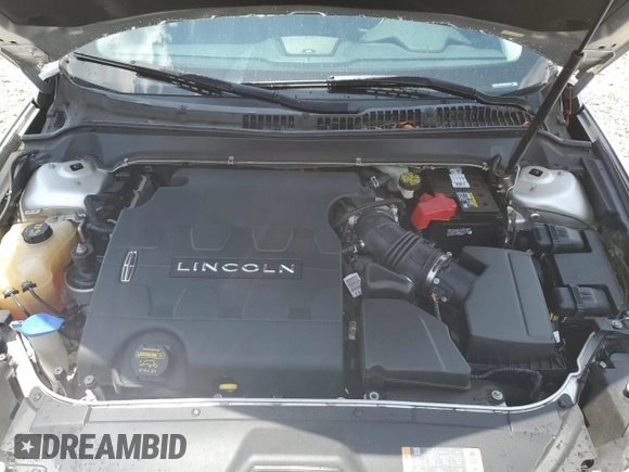 2013 Lincoln MKZ с VIN 3LN6L2JK5DR823005, выставлен на аукционе Copart как лот 60849765 с пробегом 78 318 миль миль и Списание • Salvage title. История ставок и продаж доступна на DreamBid. Изображение 11.
