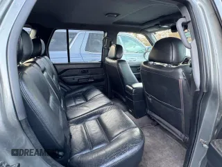 2004 Nissan Pathfinder SE with VIN JN8DR09Y64W905091, listed as a Copart auction lot 57692615 with 238,457 mi miles and Clean title. Bid and sale history available at DreamBid. Image 6.