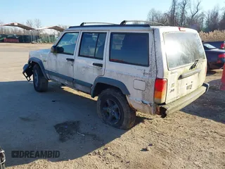 1997 Jeep Cherokee Sport with VIN 1J4FJ68S3VL551278, listed as a IAAI auction lot 41660577 with 282,264 mi miles. Bid and sale history available at carsss.com. Image 3.
