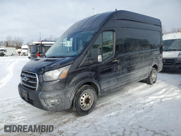 2020 Ford Transit Cargo with VIN 1FTBR2X81LKB73704, listed as a Copart auction lot 87871045 with 184,672 mi miles and Clean Title. Bid and sale history available at DreamBid. Image 1.