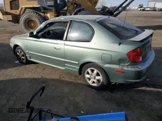 2003 Hyundai Accent GL with VIN KMHCG35CX3U242848, listed as a Copart auction lot 86558394 with 56,248 mi miles and Salvage Title. Bid and sale history available at carsss.com. Image 2.