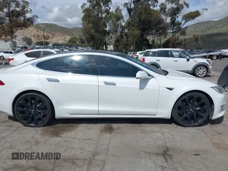 2018 Tesla Model S 75D with VIN 5YJSA1E22JF246928, listed as a IAAI auction lot 41869364 with 100,067 mi miles and . Bid and sale history available at DreamBid. Image 13.