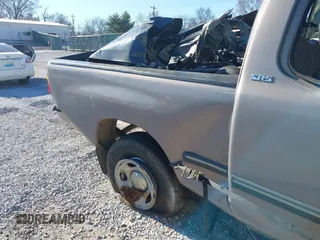 2000 Toyota Tundra SR5 with VIN 5TBRT3411YS096337, listed as a IAAI auction lot 41702651 with Not Provided miles and . Bid and sale history available at carsss.com. Image 14.