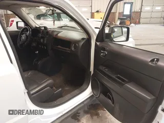 2014 Jeep Patriot Latitude with VIN 1C4NJPFA3ED739925, listed as a IAAI auction lot 41623546 with 130,374 mi miles and . Bid and sale history available at carsss.com. Image 5.