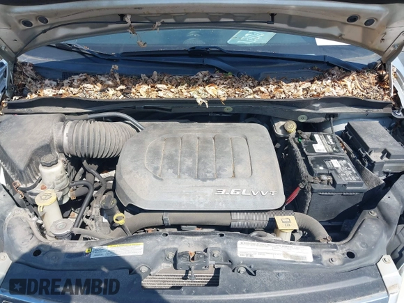 2011 Chrysler Town & Country Touring L with VIN 2A4RR8DG8BR797653, listed as a IAAI auction lot 42115304 with 185,613 mi miles and . Bid and sale history available at DreamBid. Image 10.
