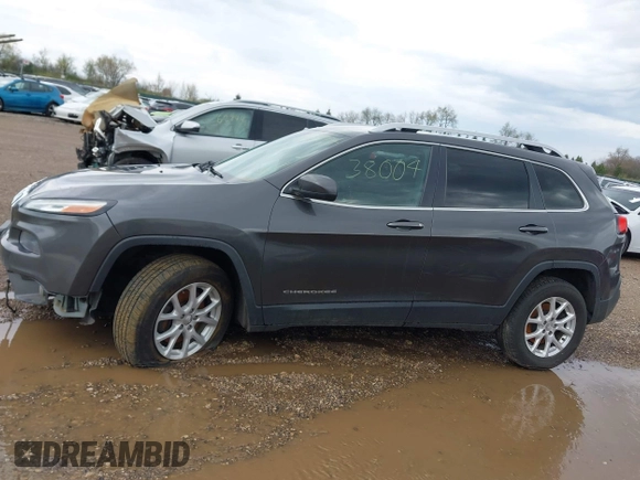 2014 Jeep Cherokee Altitude with VIN 1C4PJMCB2EW181848, listed as a IAAI auction lot 41638004 with 175,813 mi miles. Bid and sale history available at carsss.com. Image 14.