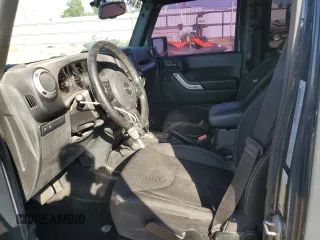 2018 Jeep Wrangler JK Unlimited Rubicon with VIN 1C4BJWFG9JL840582, listed as a Copart auction lot 73064054 with 47,590 mi miles and Salvage Title. Bid and sale history available at carsss.com. Image 7.