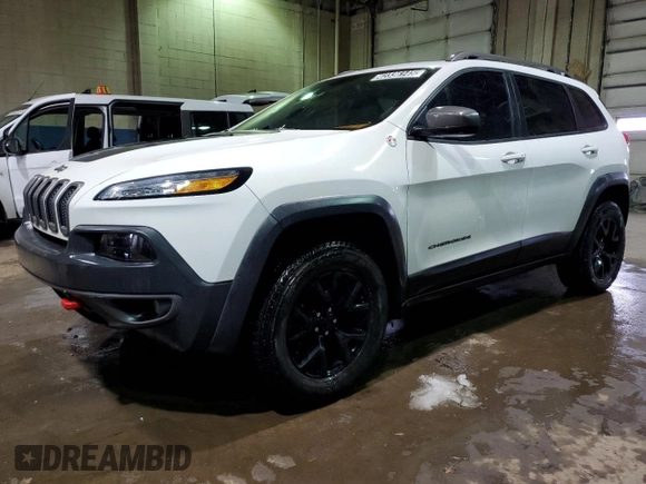 2015 Jeep Cherokee Trailhawk with VIN 1C4PJMBS7FW609741, listed as a Copart auction lot 55991595 with 125,711 mi miles and Clean title. Bid and sale history available at DreamBid. Image 1.