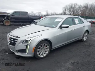 2014 Cadillac CTS Luxury AWD z VIN 1G6AX5SX3E0194895, wystawiony jako IAAI lot #41741824 z przebiegiem 197 042 mil mil oraz . Historia ofert i sprzedaży dostępna na DreamBid. Obrazek 2.