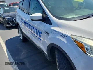 2014 Ford Escape SE z VIN 1FMCU9GX4EUC03056, wystawiony jako IAAI lot #42293273 z przebiegiem 92 444 mil mil oraz . Historia ofert i sprzedaży dostępna na DreamBid. Obrazek 1.