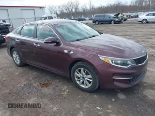2016 Kia Optima LX with VIN 5XXGT4L36GG108599, listed as a IAAI auction lot 42065639 with 127,387 mi miles. Bid and sale history available at carsss.com. Image 1.