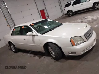 2003 Cadillac DeVille with VIN 1G6KD54Y63U178022, listed as a IAAI auction lot 42076667 with 141,863 mi miles. Bid and sale history available at carsss.com. Image 13.